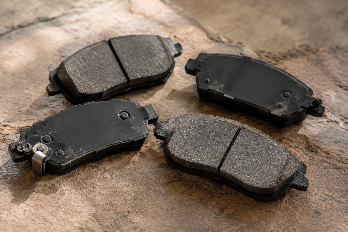 Disc brake pads showing friction surfaces and backing plates