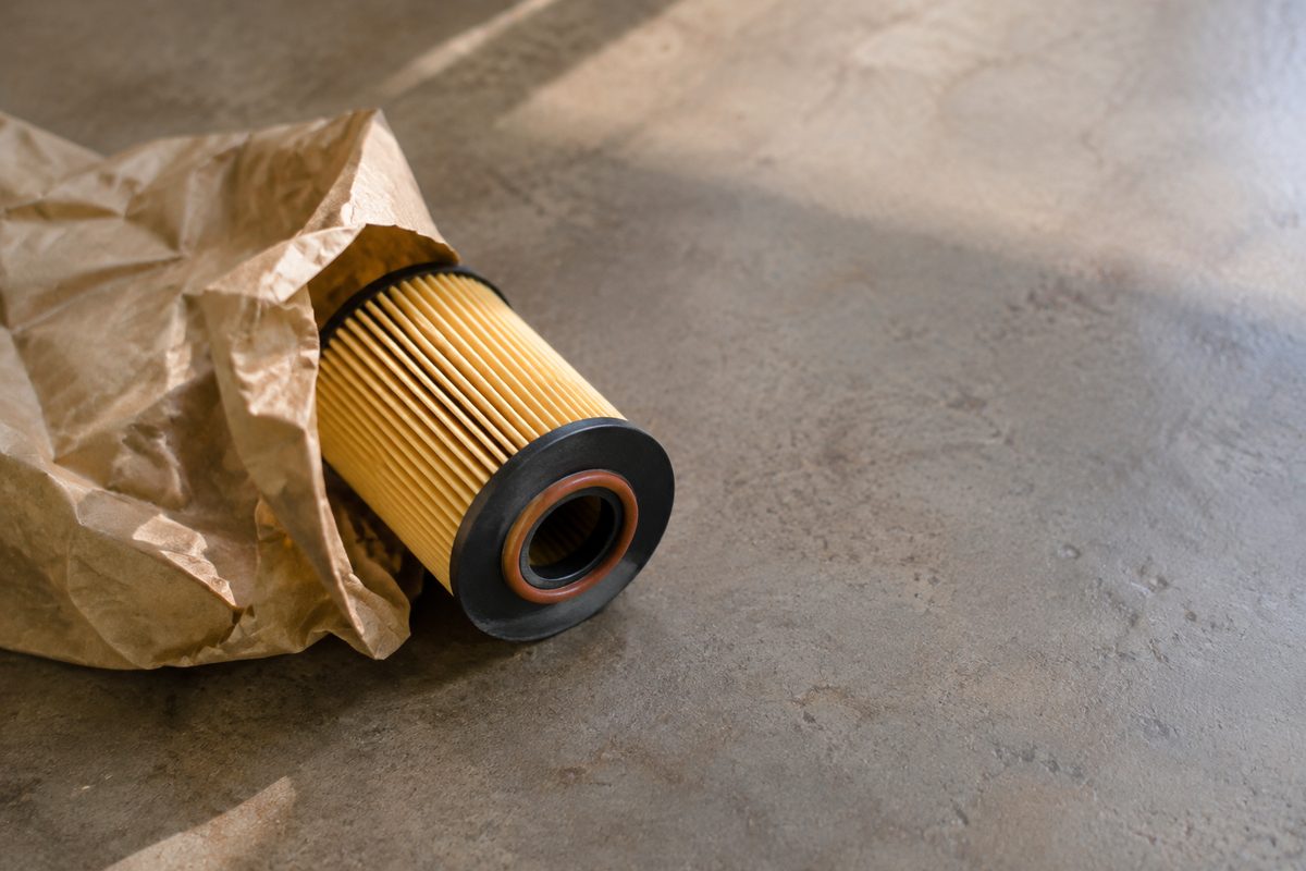 Replacement filter beside its opened protective wrapper
